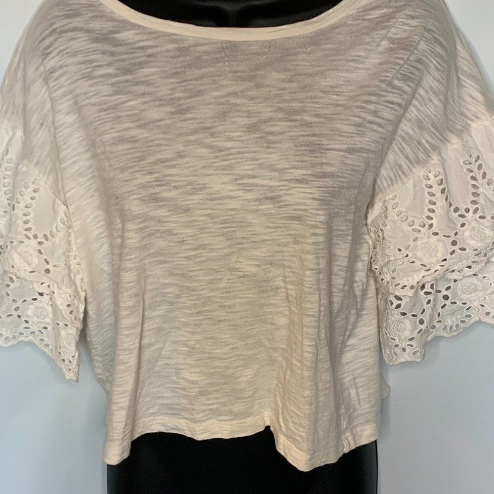 The Impeccable Pig Cream Cropped Lace Arm Accent Top